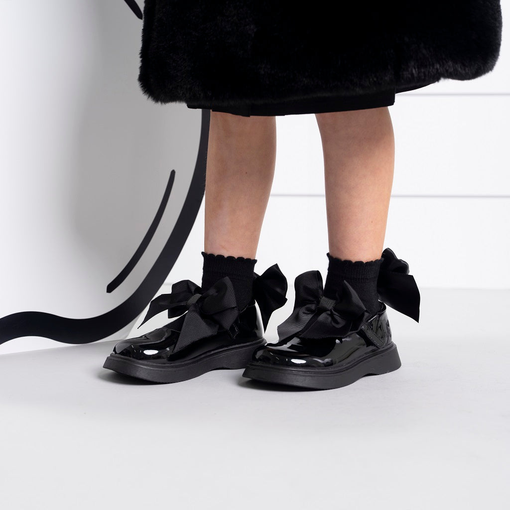 ADEE pixie ankle socks with a satin frill detail around the cuff, adding a touch of style to any outfit. Black