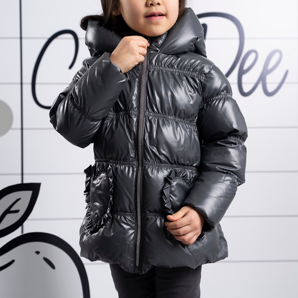 ADEE BTS The Luna padded jacket features cute heart shaped pockets on the front and diamante badge on one sleeve. Complete with full hood and branded zip fastening. Dark Grey