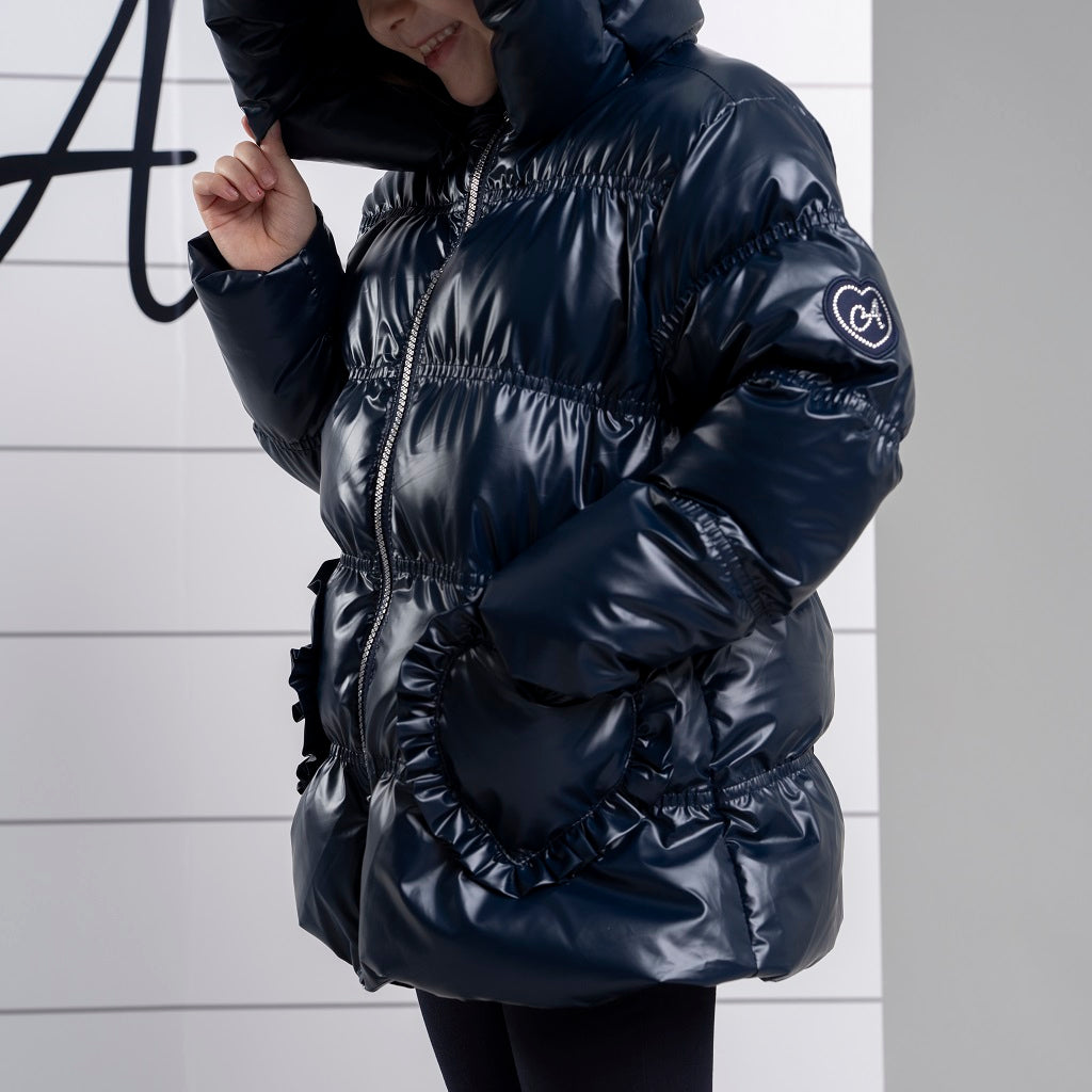 ADEE BTS The Luna padded jacket features cute heart shaped pockets on the front and diamante badge on one sleeve. Complete with full hood and branded zip fastening. Navy
