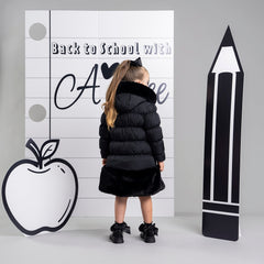 ADEE BTS The Rhea long length padded jacket features a luxurious fur trim around the hem and on the hood. Complete with a diamante badge on one sleeve and branded zip fastening. The perfect jacket to keep cosy going back to school.