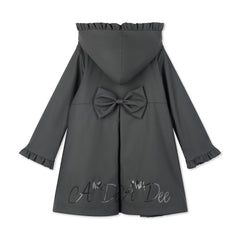 ADEE BTS The Nova is the must-have back to school raincoat! It features front and back pleats with pretty bow detailing, branding around the hem and frills at the cuffs and hood. Complete with a silver reflective logo badge on one arm and a silver branded puller. Dark Grey