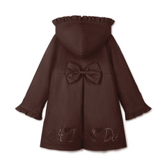 ADEE BTS The Nova is the must-have back to school raincoat! It features front and back pleats with pretty bow detailing, branding around the hem and frills at the cuffs and hood. Complete with a silver reflective logo badge on one arm and a silver branded puller. Brown