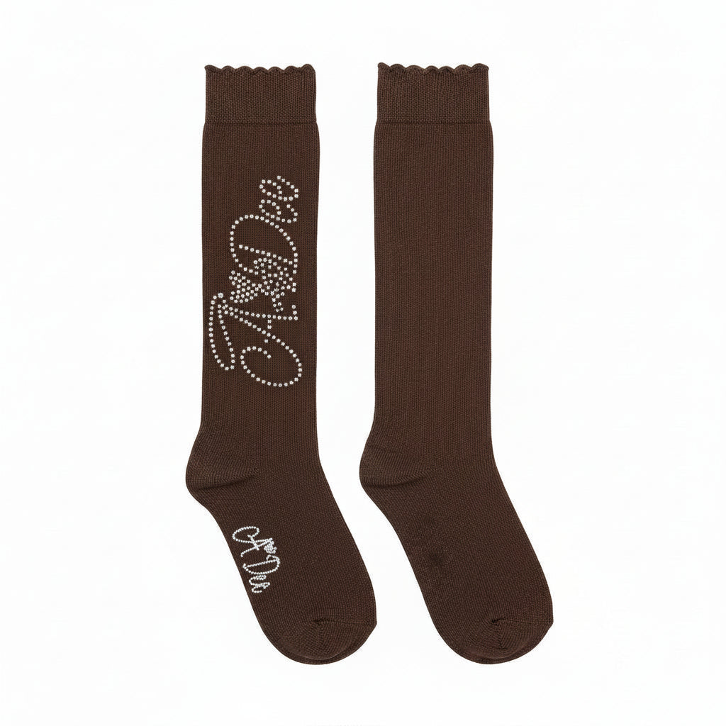ADEE Complete your back to school outfit with the Seren knee high socks. Featuring a sparkling diamante logo on each side. Brown