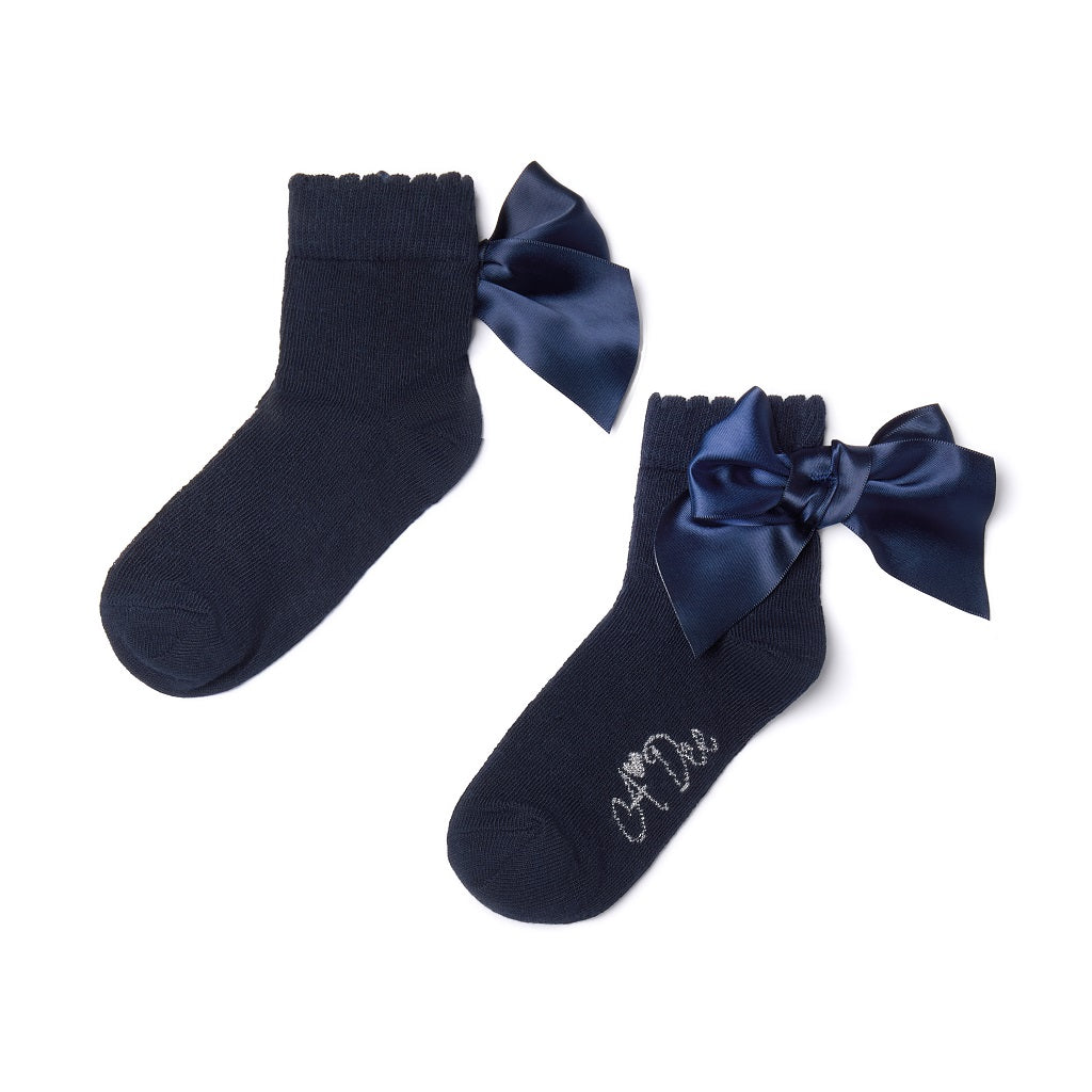 ADEE pixie ankle socks come in 3 classic colourways with a satin frill detail around the cuff, adding a touch of style to any outfit. Dark Navy