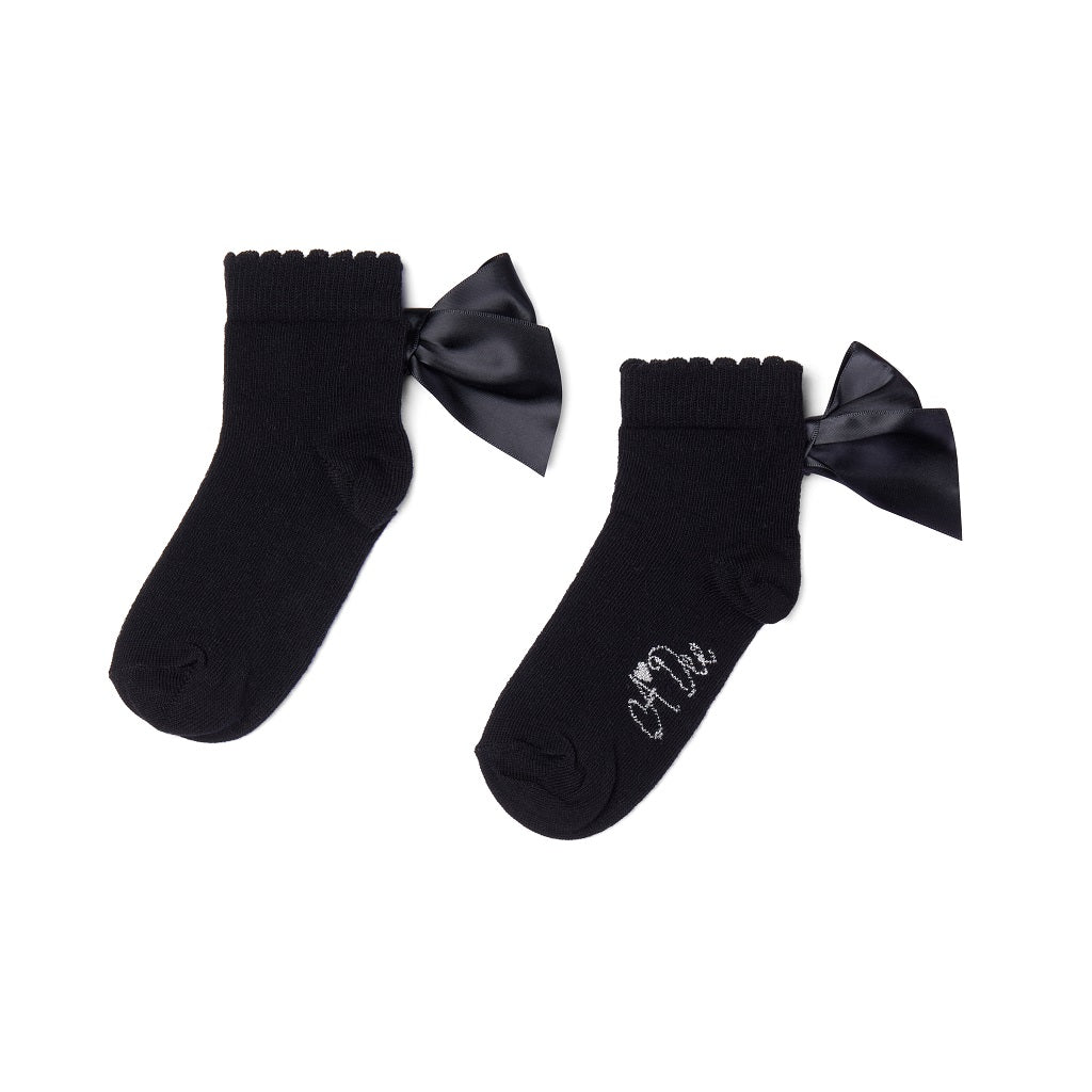 ADEE pixie ankle socks with a satin frill detail around the cuff, adding a touch of style to any outfit. Black