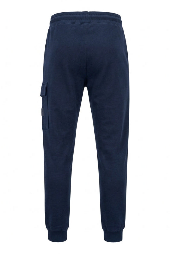 C.P. Company Kids track pants with signature lens details, side cargo pocket, elasticated waistband and ribbed cuffs . 100% Cotton. Dusty Blue